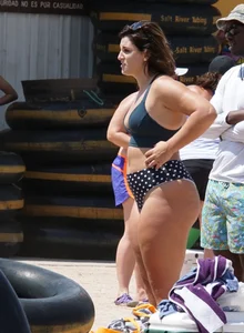 Girls in bikinis getting ready for tubing