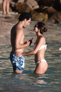 Iris Mittenaere in a white thong bikini on the beach in St Martin