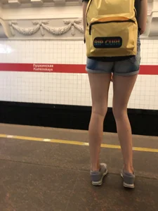 Cute Skinny Teen in Jean Mini Shorts Standing on the Subway Platform