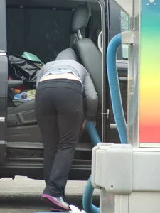 Girls cleaning their cars in jeans and pants
