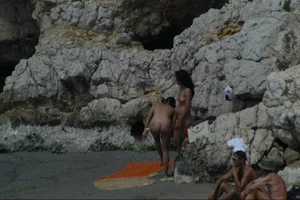 Girls on a nude beach in Sitges, Spain