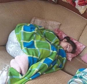 Girl in Pink Socks Asleep on the Couch Home Candid Photo