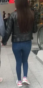 Girl in jeans walking with her boyfriend