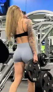 Petite blonde with bubble butt in blue spandex shorts