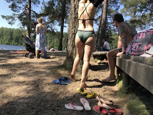 Candid Girl Putting On Swimsuit and Undressing at the Forest Lake Beach Gallery