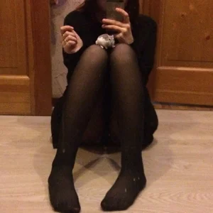Girl Sitting on the Floor in Black Pantyhose Mirror Selfie