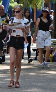 Skinny blonde chick in little denim shorts