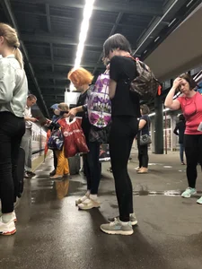 Teen Girl in Tights And Sneakers Standing on the Train Platform VPL Photos