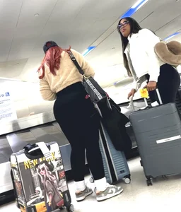 2 pretty ebony juicy booty at airport and bending over
