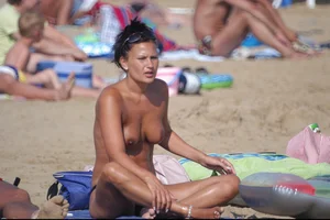 Girls on a nude beach in Bibione, Italy
