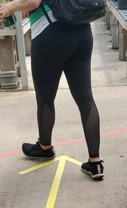 Big booty brunette buying plants in tight leggings