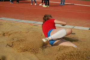 Athlete Jumper Girl Lying in the Sand Candid