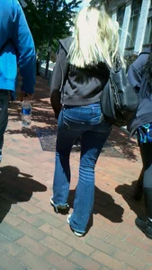 Blonde in tight jeans with her red thong sticking out