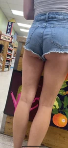 College hottie showing off her cheeks at trader hoes