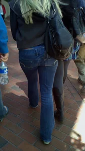Blonde in tight jeans with her red thong sticking out