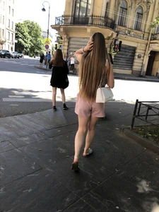 Cute candid girl in pink shorts street photos