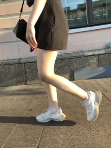 Nice Candid Legs in a Short Dress and White Sneakers Closeups