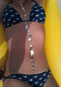 Hot girl taking a nap at the beach