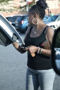 Ebony milf out shopping in grey leggings