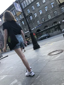 Candid Teen in Denim Shorts And Sneakers With Slim Legs Street Photos