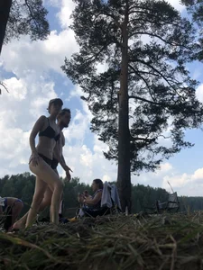 Skinny and Tall Girl in Swimsuit Walking in a Wood