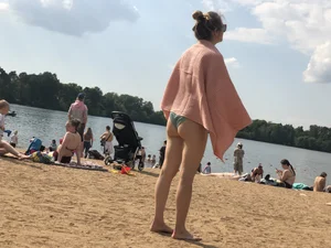 A Hot Candid Milf in a Swimsuit Playing Ball at the Beach Creepshots Gallery