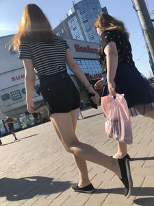 Candid teen in shorts with nice legs and booty street pics