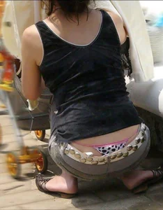 Strings Peeking out from Under Pants
