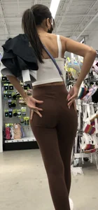 Slim latina in light brown leggings