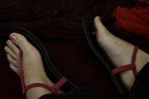 Home candid closeups of girl's feet