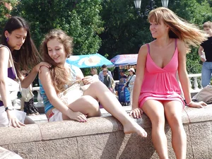 Pink skirt girl upskirted at fountain