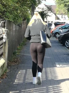 Shapely blonde in black leggings