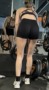 Hot blonde with great ass in gym