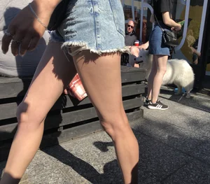 Girl in Denim Shorts with Amazing Hot Legs Fixing Her Sandals Street Candid Photo Gallery