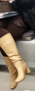 Milf in tight pants and boots Subway Creepshot