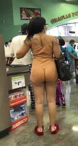 Latina with hard nipples and a big booty in tight spandex shorts outfit