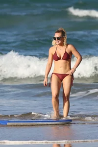 Hilary Duff in maroon bikini on the beach with a big booty