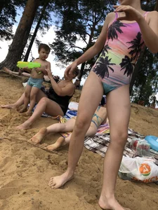 Girls in One-Piece Body Swimsuits Running Towards Water and Swimming - Beach Photo Gallery