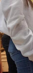 Girl is showing her blue jeans
