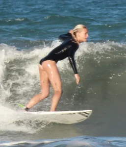 Hot surfer chicks out in the water