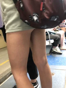 Skinny Candid Teen's Legs in Shorts With Visible Leg Hair Subway Photo Gallery