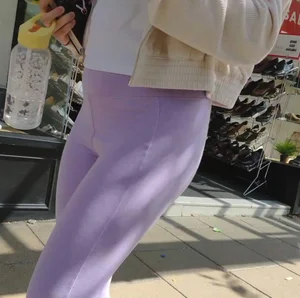 Cute teen in lilac leggings