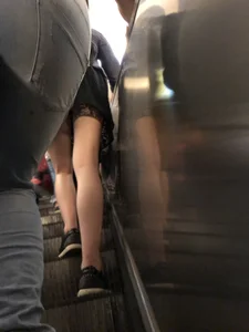 Girl in a Skirt with Skinny Legs on the Subway Escalator Creepshot
