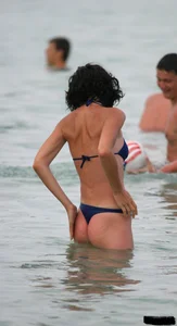 Beach voyeur girls in bikinis, thongs and topless