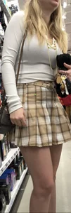 Busty butter face in a skirt and tight top