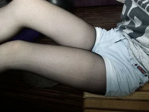 Hot Closeup Creepshot of Long Legs in Fishnet Pantyhose