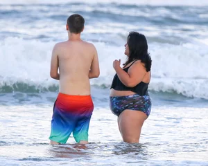 Extra thick girl at the beach in a bikini