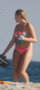 Thick blonde bikini babe on the beach