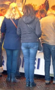 Milf with a flat ass wearing tight blue jeans creepshot