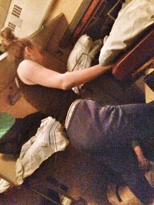 Teen in Track Pants in a Sleeping Train Car Candid